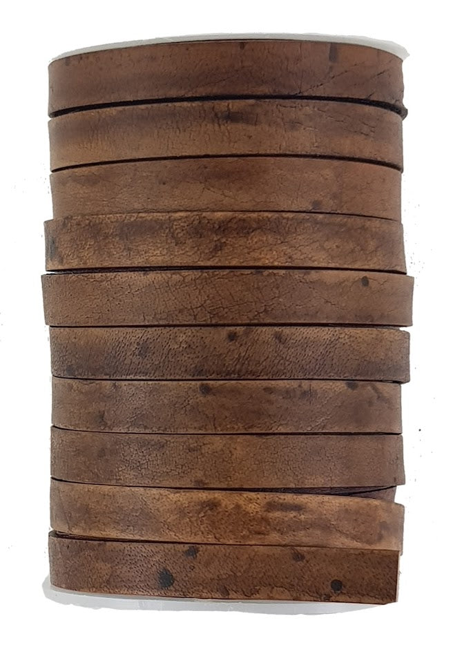 Brown leather strips 1 meter long x 10 mm wide 2 mm thick.